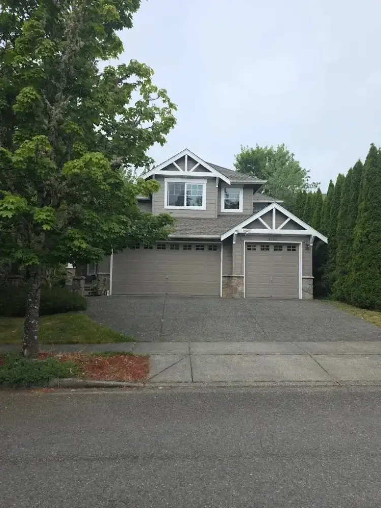 Clean roofline and gutters on a Western Washington home