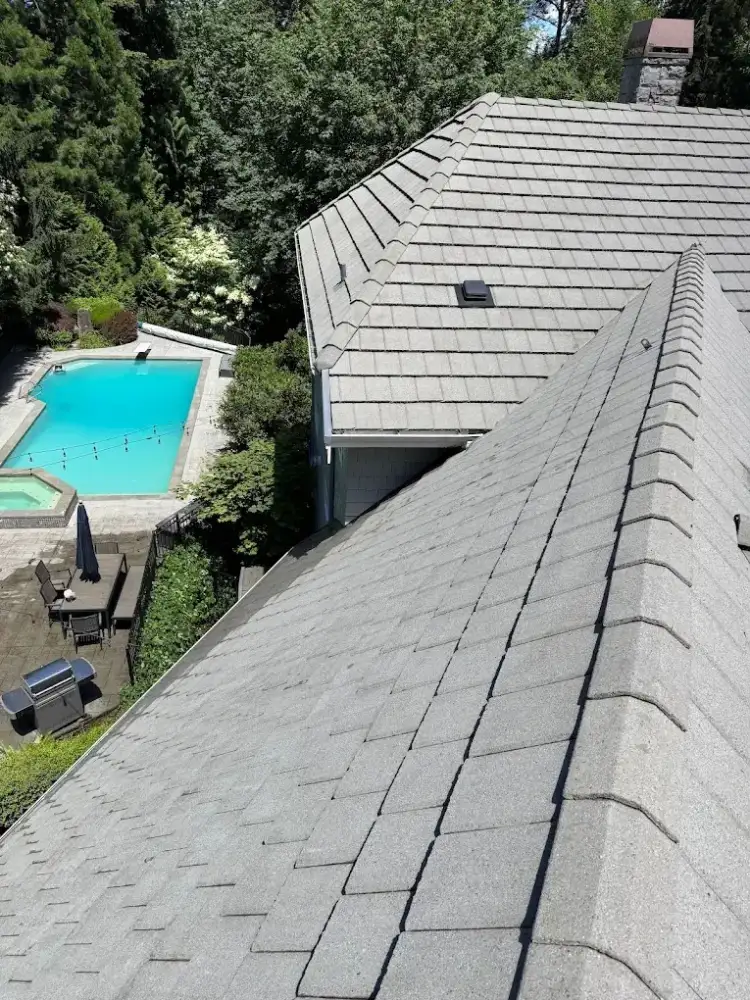 Aerial view of a composition shingle roof during an inspection
